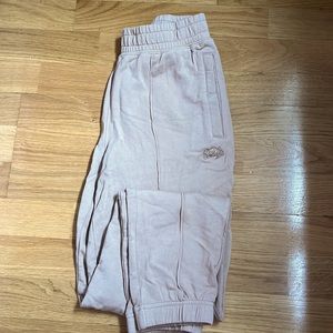Beige roots joggers. Cuffed ankle